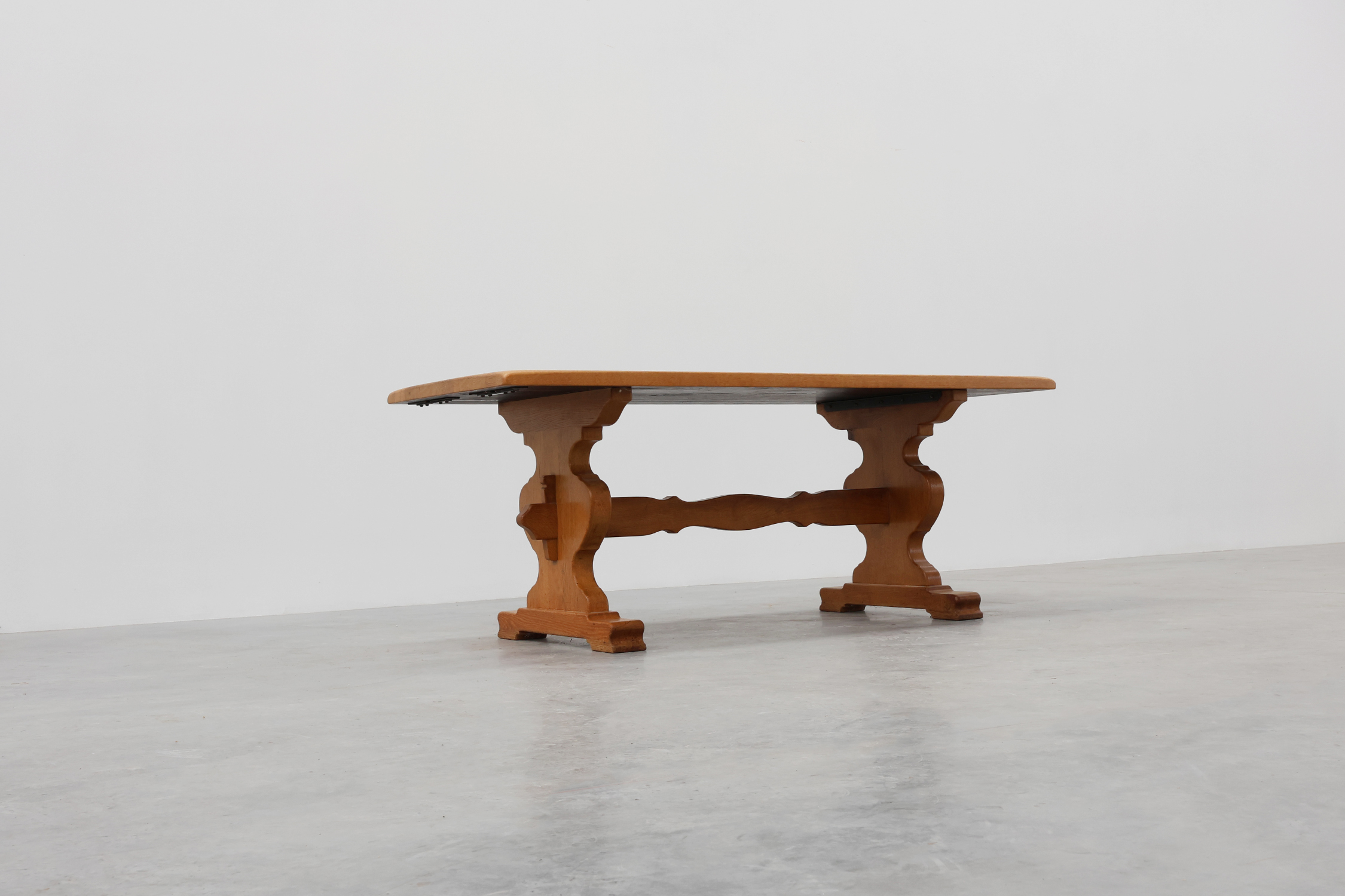 20th Century French oak trestle table with scalloped legs and plank topthumbnail